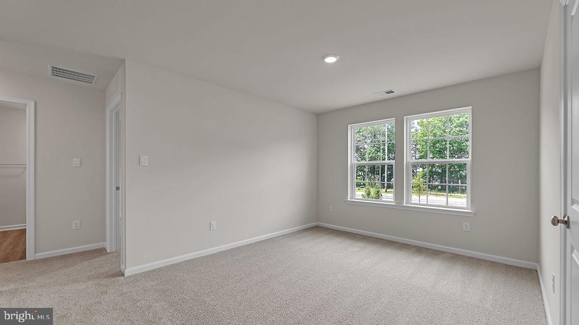 155 Littleworth Road Manahawkin, NJ 08050 - Photo 24 of 32 a view of an empty room with a window