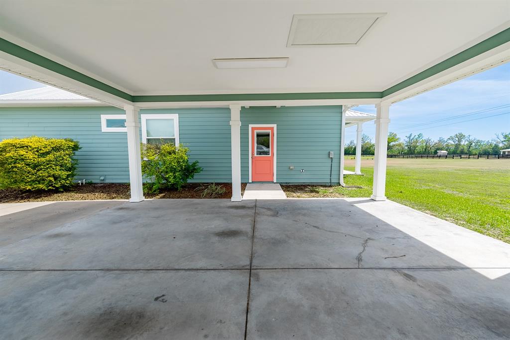 6095 Southwest 82nd Place Trenton, FL 32693 - Photo 11 of 44 a view of a house with backyard and garden