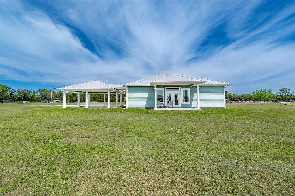 6095 Southwest 82nd Place Trenton, FL 32693 - Photo 13 of 44 a front view of house with yard and green space