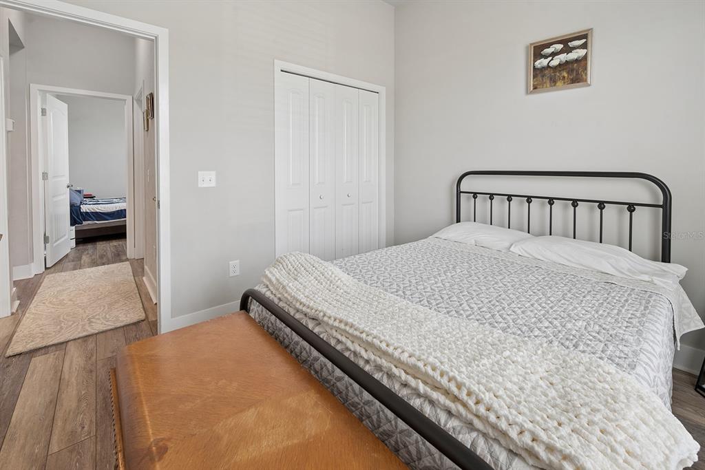 6095 Southwest 82nd Place Trenton, FL 32693 - Photo 28 of 44 a bedroom with a bed and bathroom