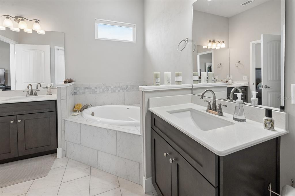 6095 Southwest 82nd Place Trenton, FL 32693 - Photo 40 of 44 a bathroom with a sink and a mirror