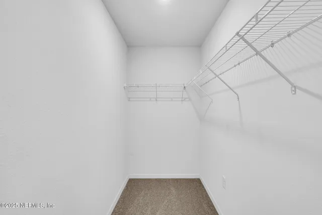 a view of a room with racks on the wall