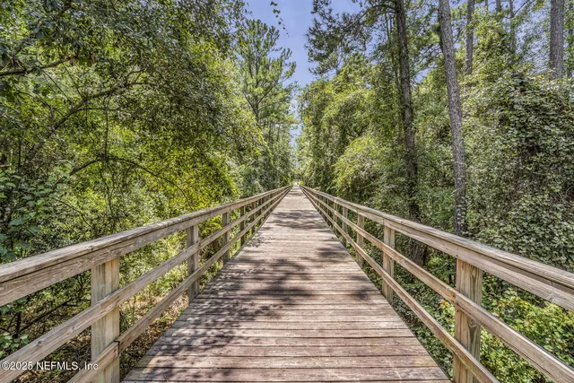 a view of balcony and yard