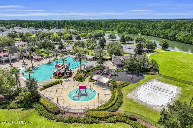 a view of a swimming pool with a garden