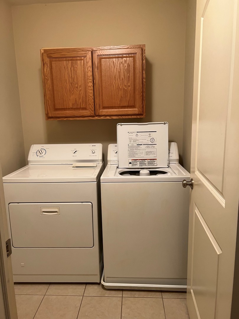 412 North Grainger Lane Cortland, IL 60112 - Photo 9 of 9 a utility room with dryer and washer