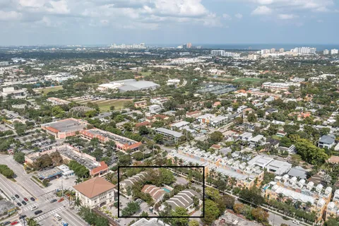 an aerial view of residential building with parking space