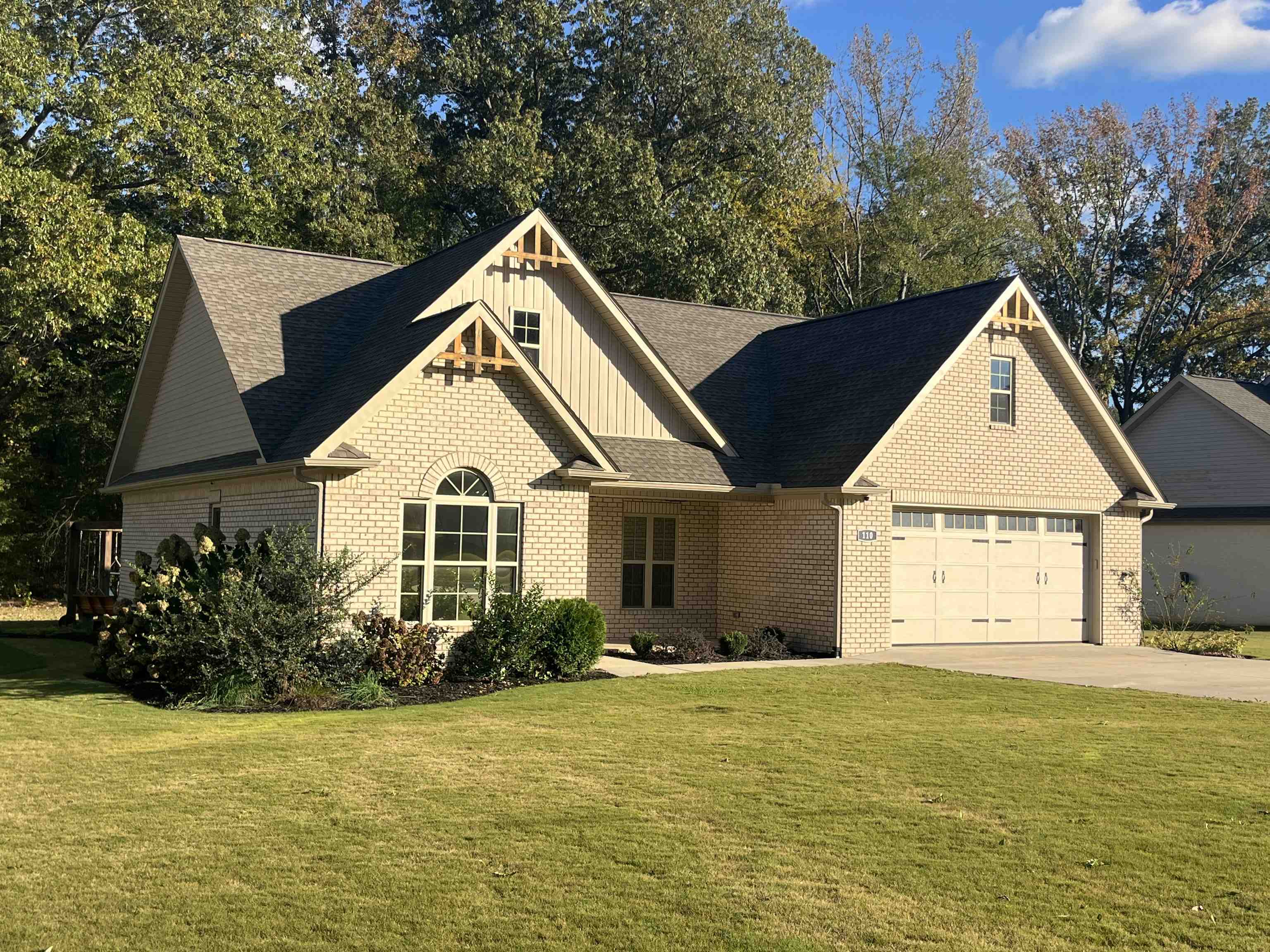 110 RB Drive Savannah, TN 38372 - Photo 2 of 18 a view of a house with backyard and garden