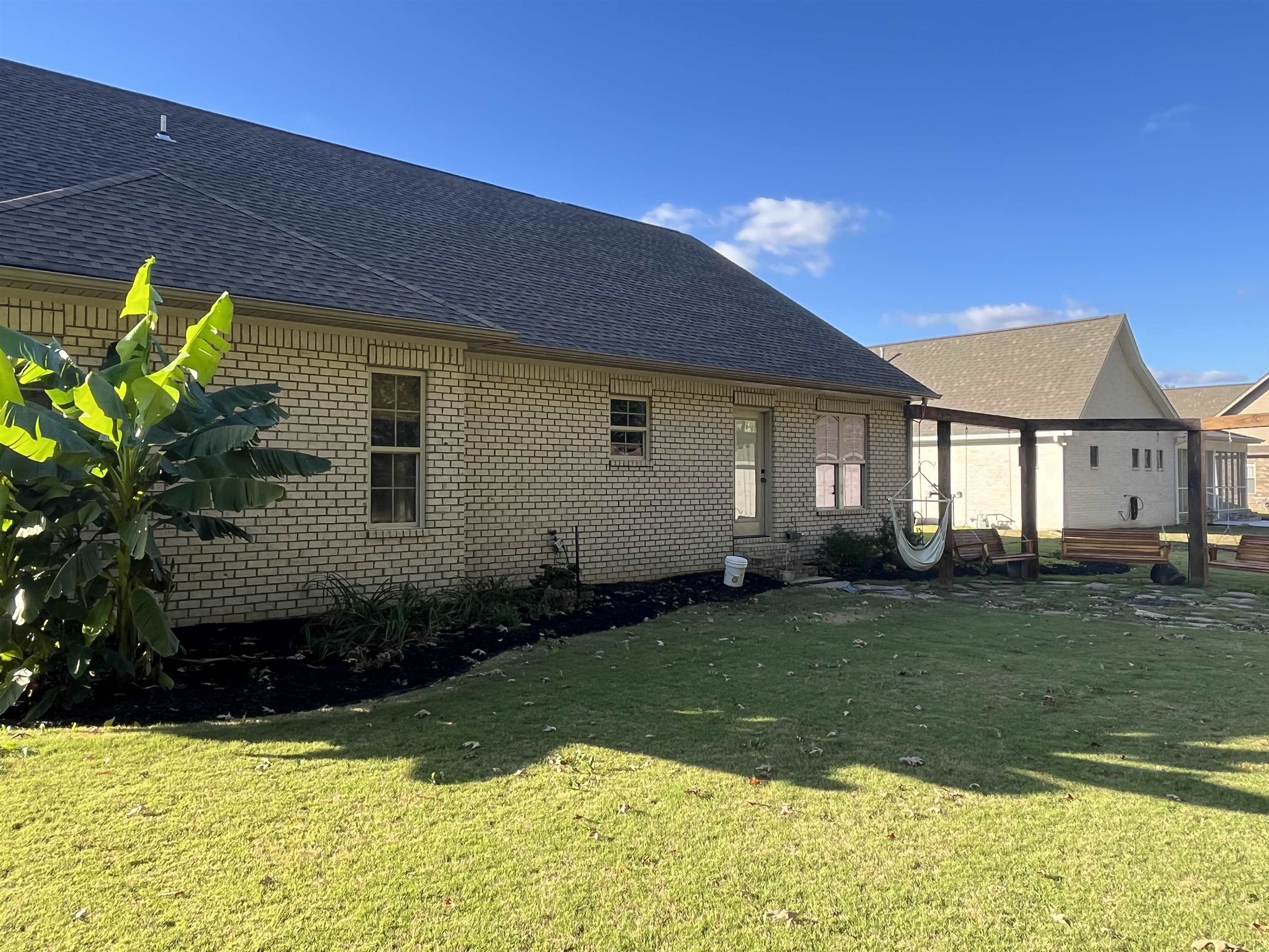 110 RB Drive Savannah, TN 38372 - Photo 5 of 18 a front view of a house with garden