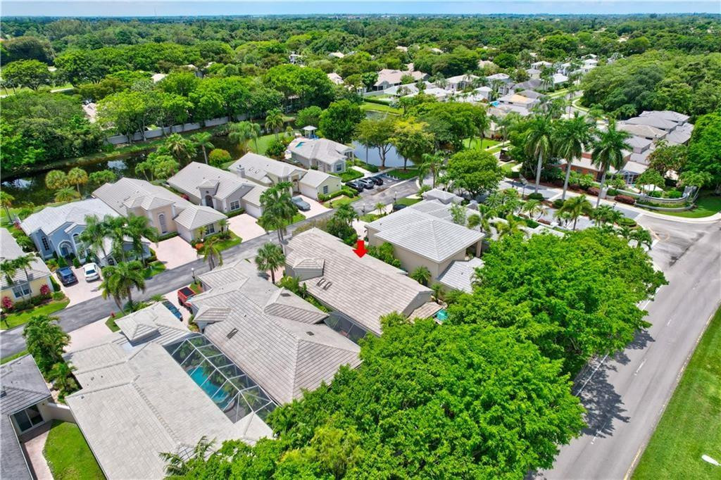 8171 Hampton Wood Drive Boca Raton, FL 33433 - Photo 37 of 56 an aerial view of residential houses with outdoor space