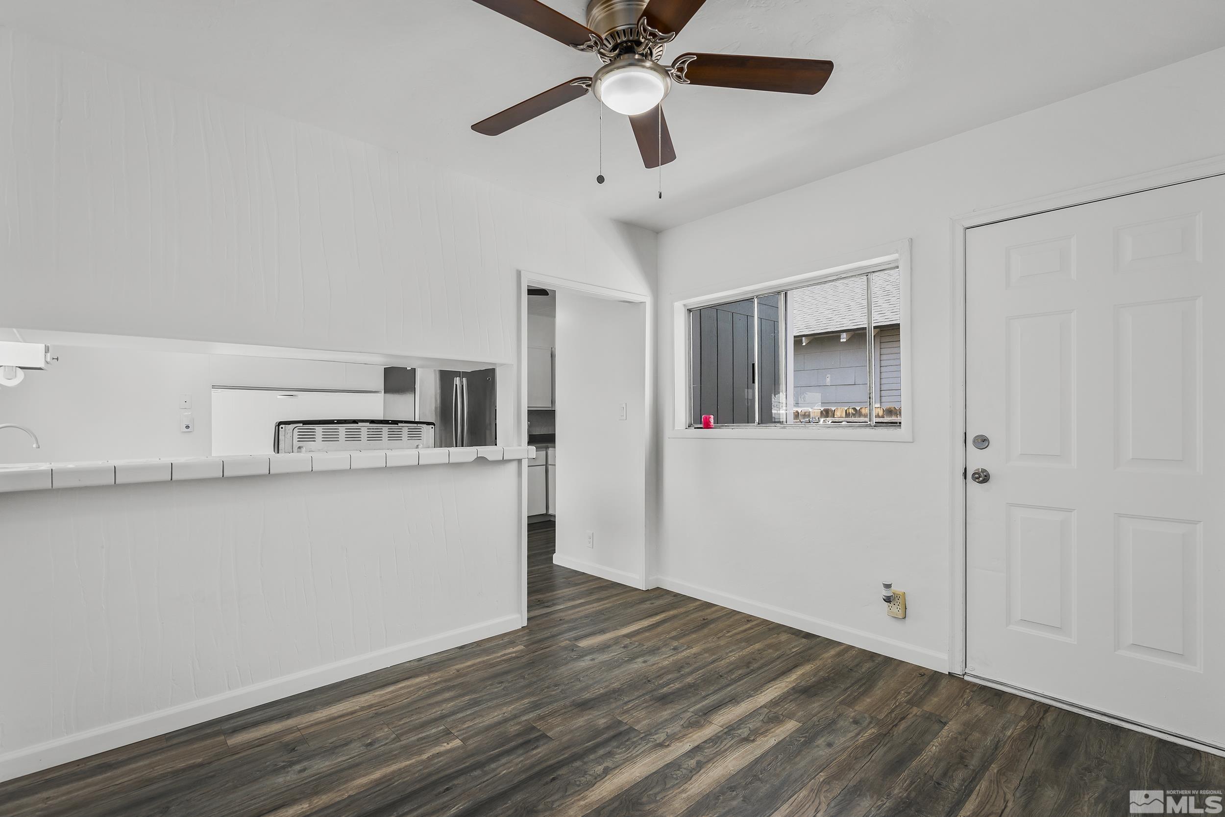 626 Burns Street Reno, NV 89502 - Photo 5 of 15 a view of kitchen with stainless steel appliances cabinets and wooden floor