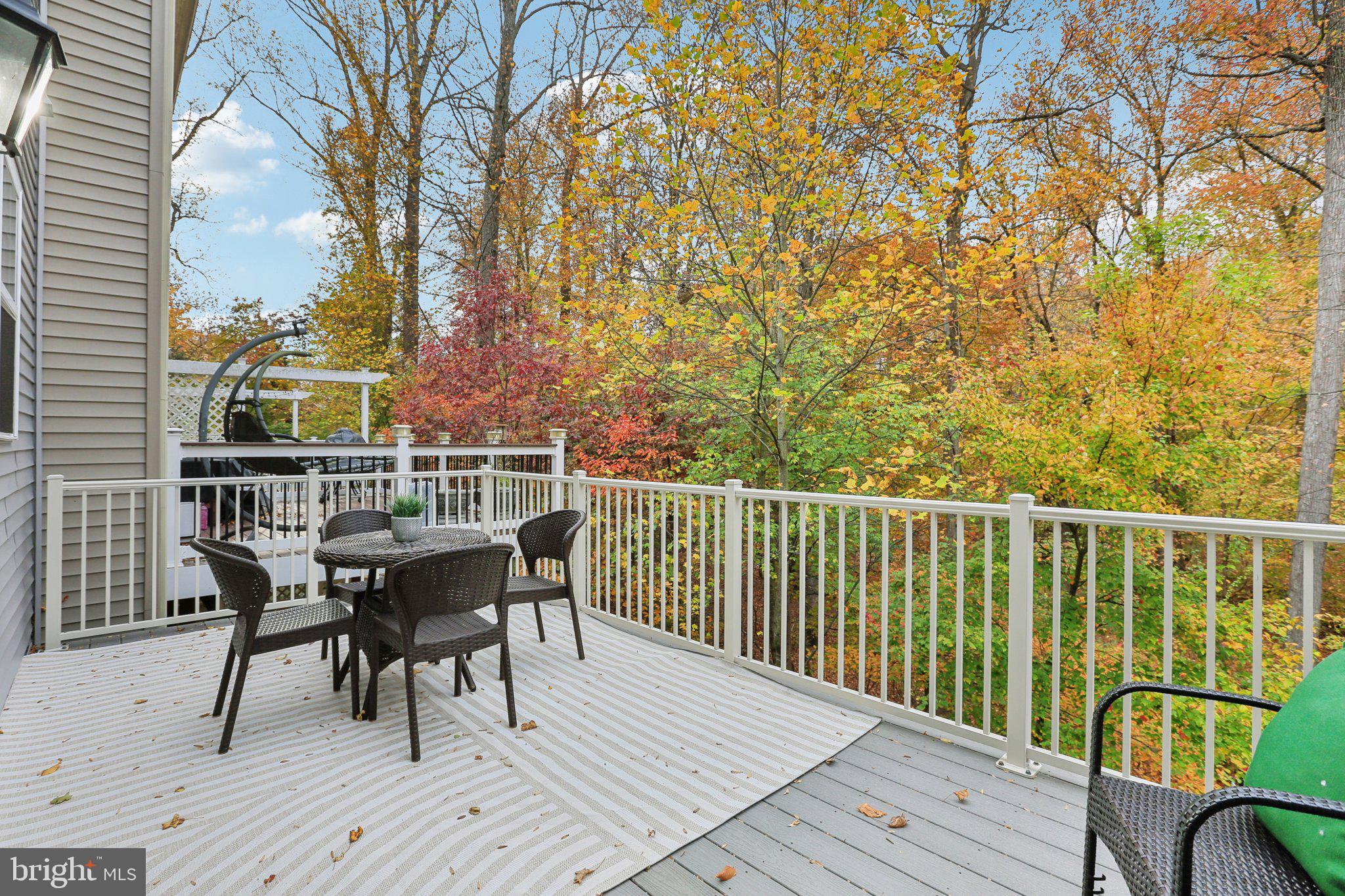 9384 Rock Ripple Lane Laurel, MD 20723 - Photo 36 of 43 Serene deck with vibrant autumn views.