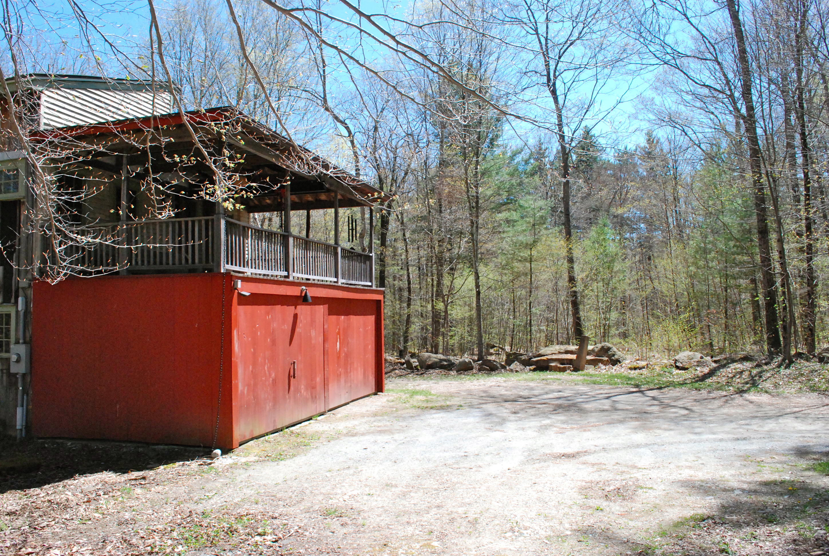 53 Harmon Road Monterey, MA 01245 - Photo 21 of 31 THE COVERED PORCH AND WOODS BEYOND