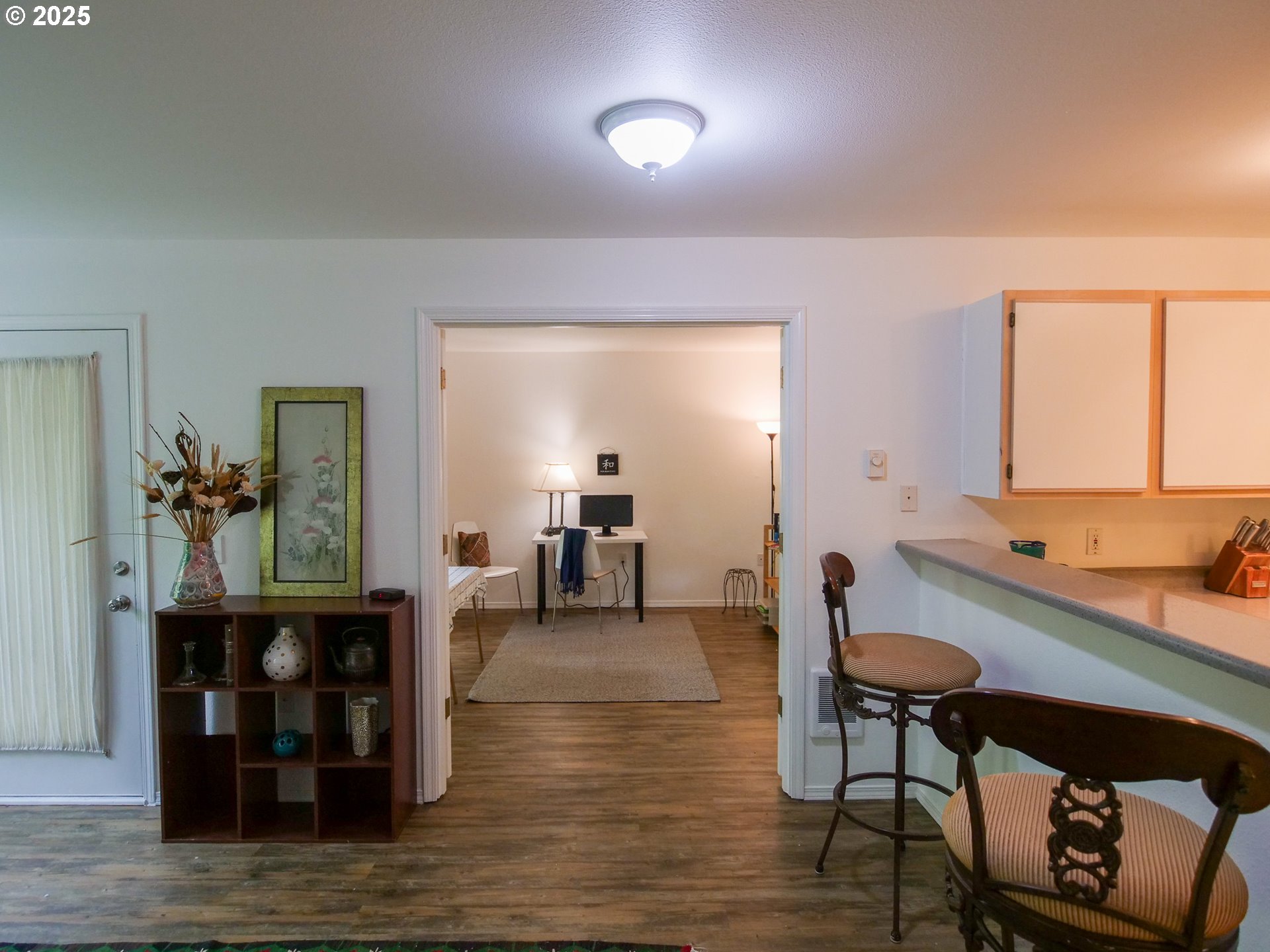 5130 Southwest Multnomah Boulevard, Unit B Portland, OR 97219 - Photo 17 of 36 a room with furniture and window