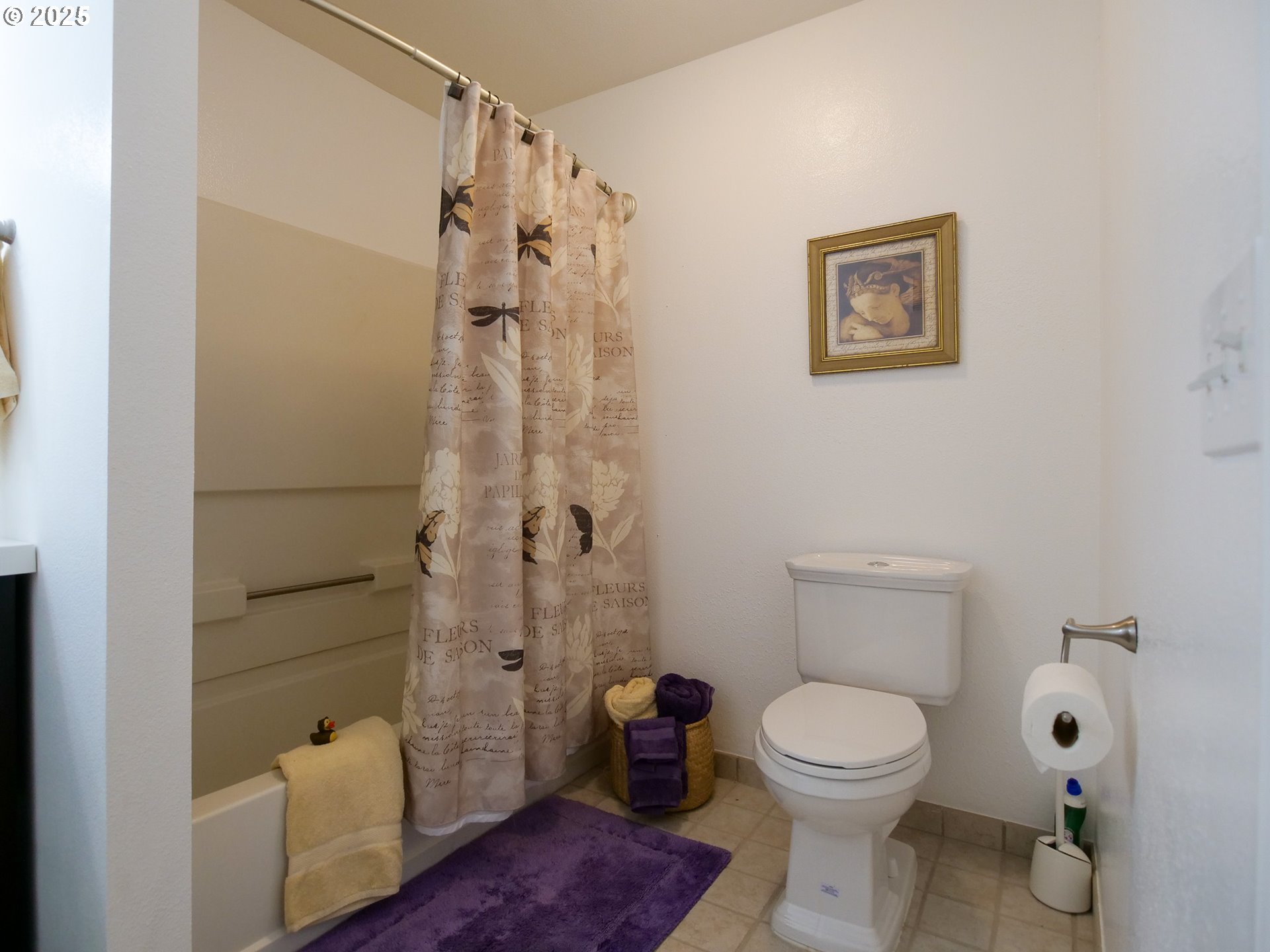5130 Southwest Multnomah Boulevard, Unit B Portland, OR 97219 - Photo 25 of 36 a bathroom with a toilet and a shower