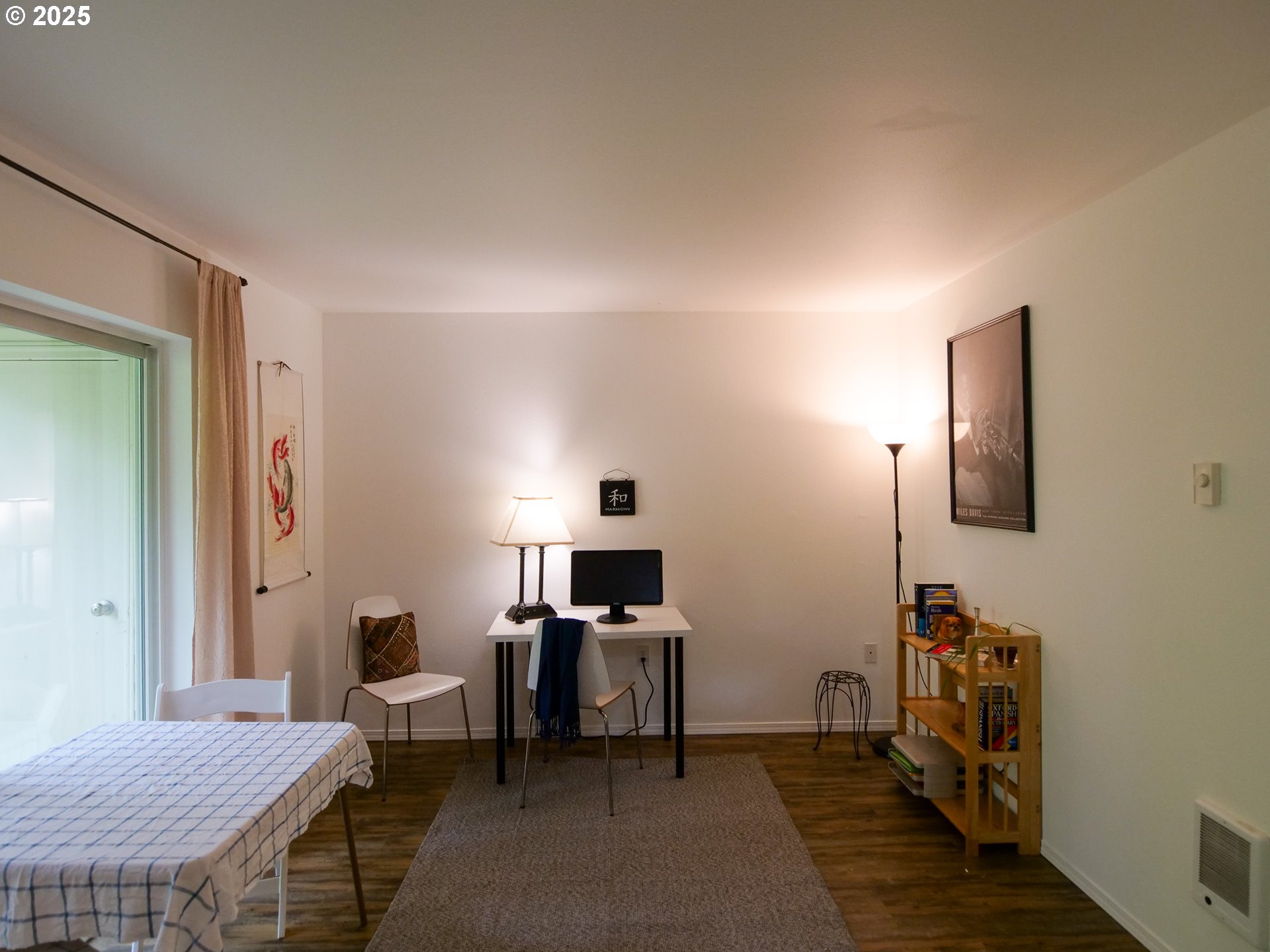 5130 Southwest Multnomah Boulevard, Unit B Portland, OR 97219 - Photo 27 of 36 a bedroom with furniture and a window
