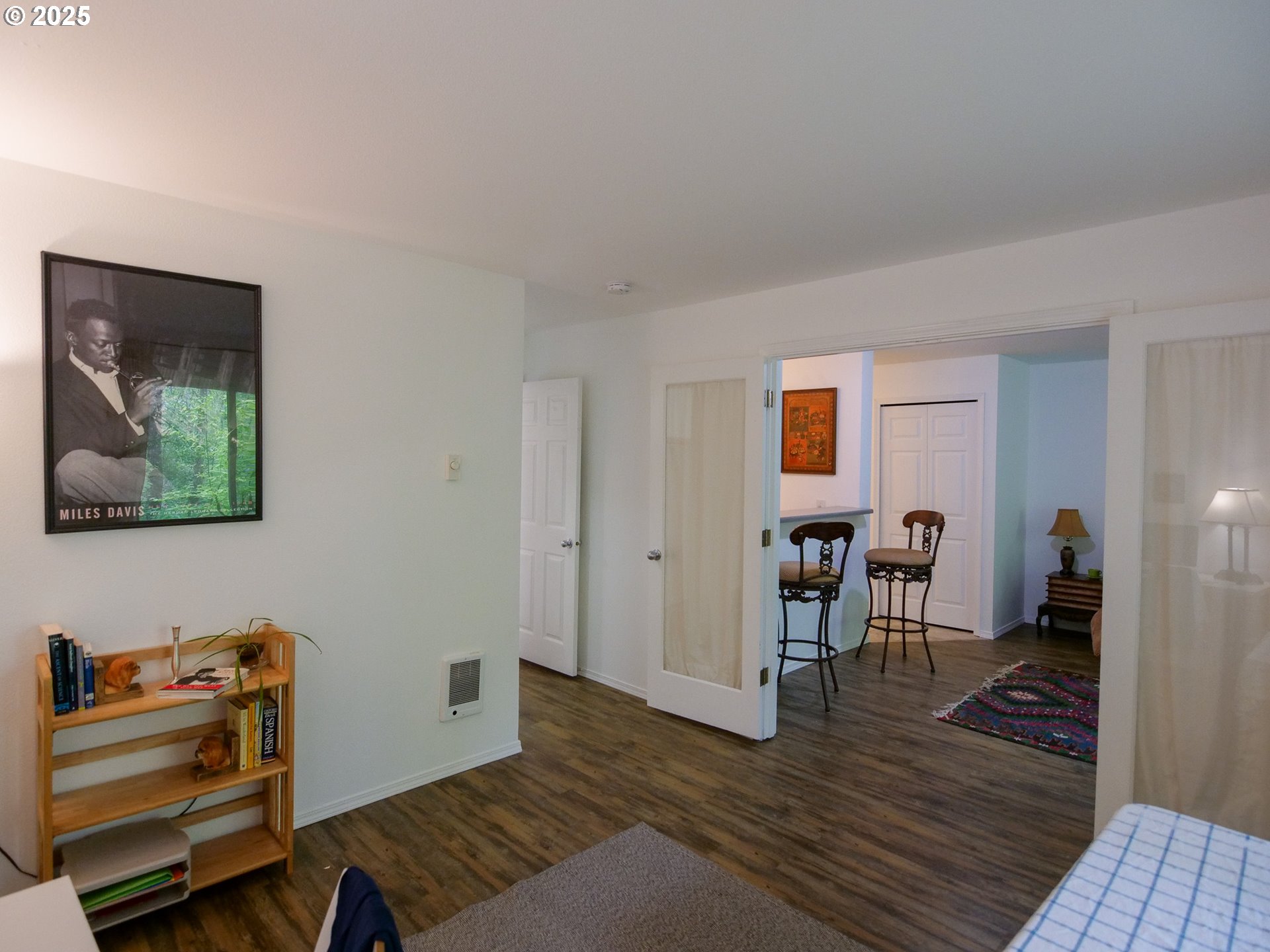 5130 Southwest Multnomah Boulevard, Unit B Portland, OR 97219 - Photo 28 of 36 a view of a livingroom with furniture and wooden floor