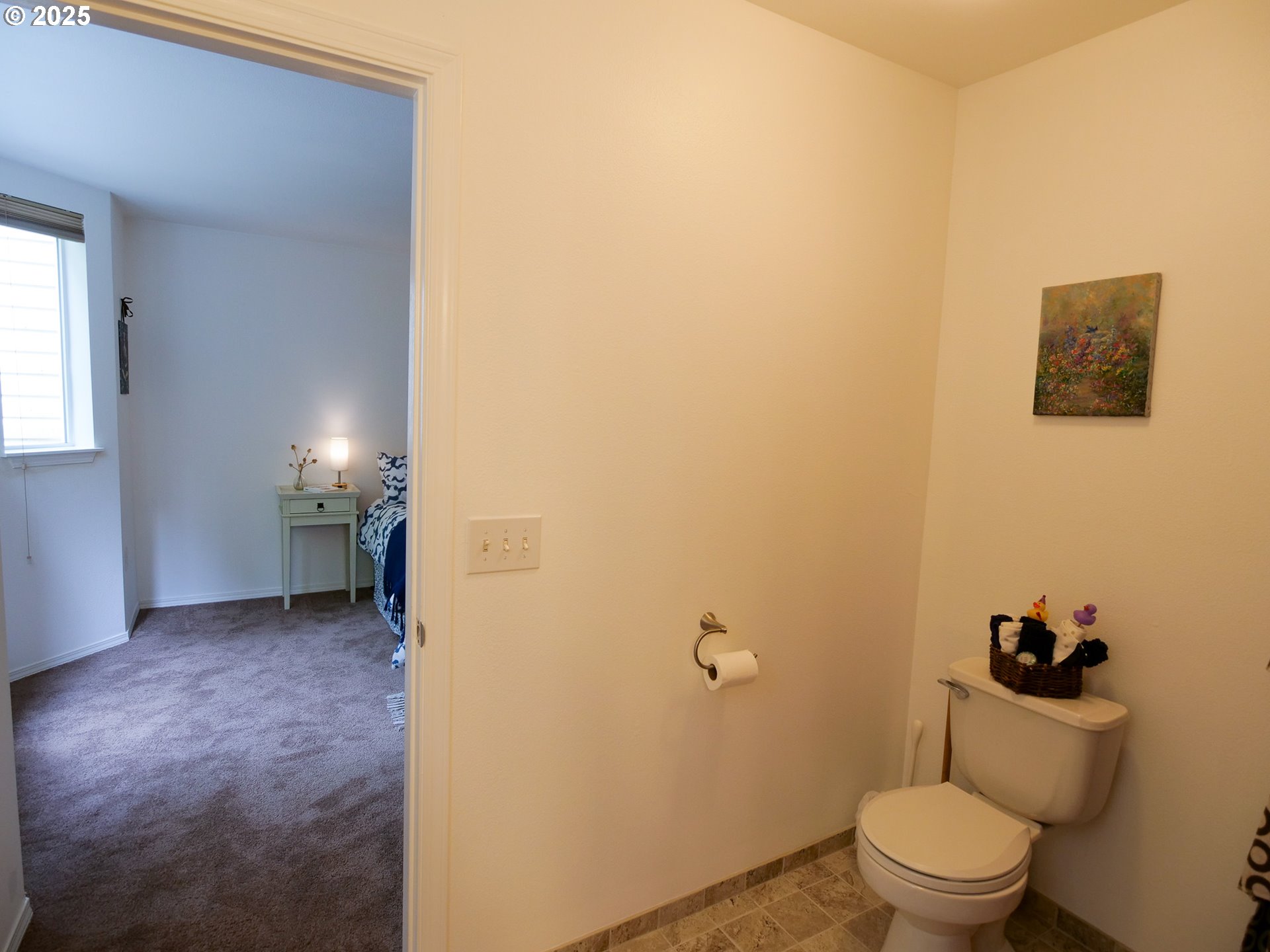 5130 Southwest Multnomah Boulevard, Unit B Portland, OR 97219 - Photo 30 of 36 a bathroom with a toilet