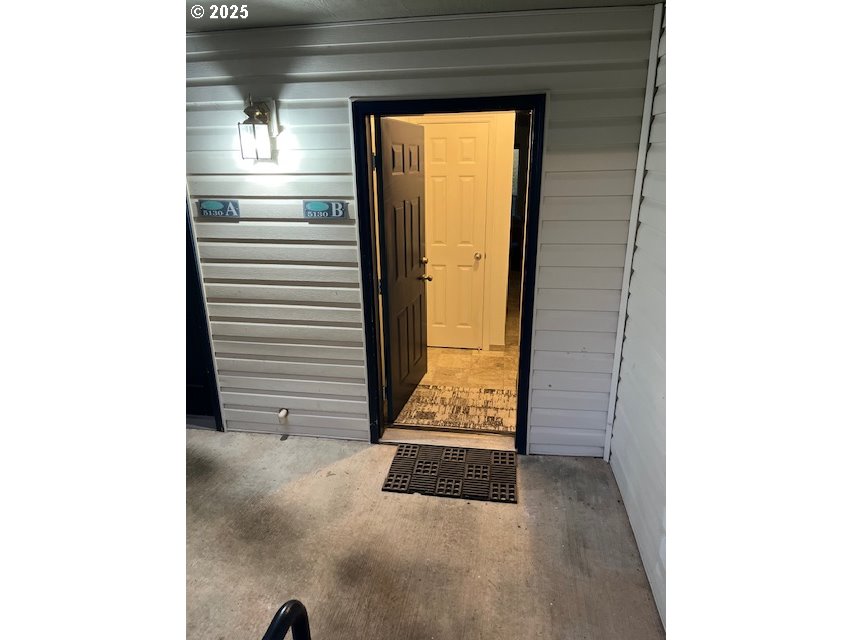 5130 Southwest Multnomah Boulevard, Unit B Portland, OR 97219 - Photo 3 of 36 a view of an entryway door