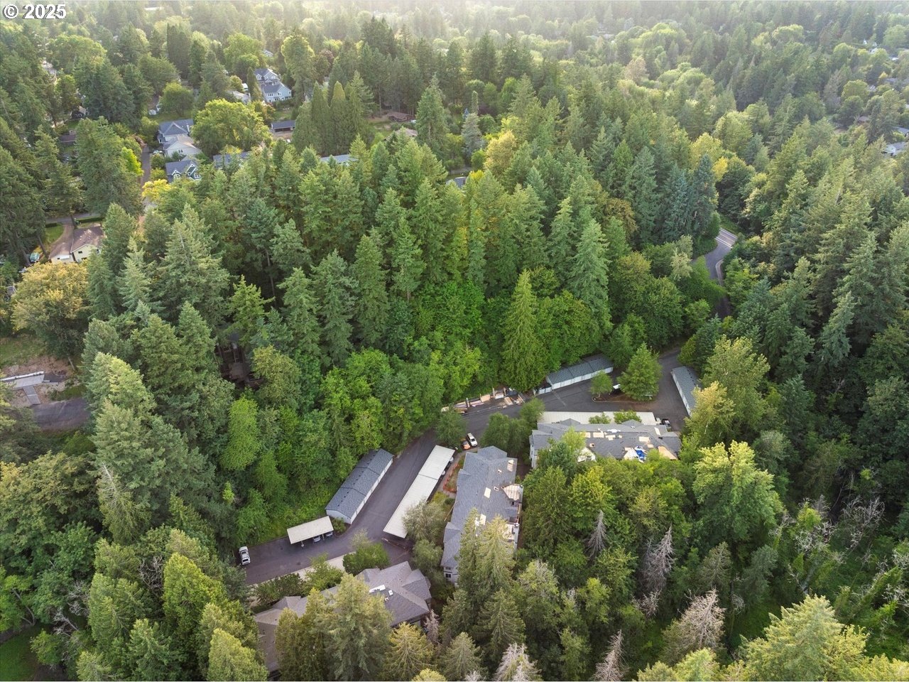 5130 Southwest Multnomah Boulevard, Unit B Portland, OR 97219 - Photo 36 of 36 an aerial view of residential house with outdoor space and trees all around