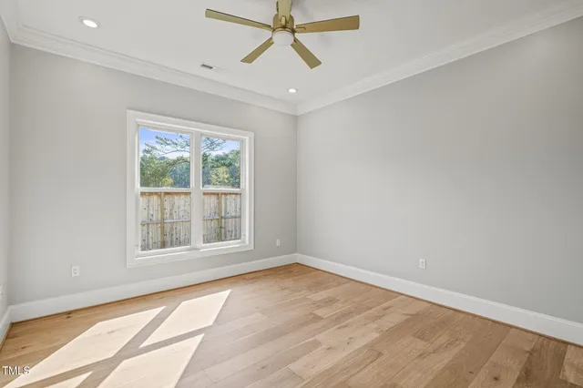 a kitchen with a sink and a refrigerator
