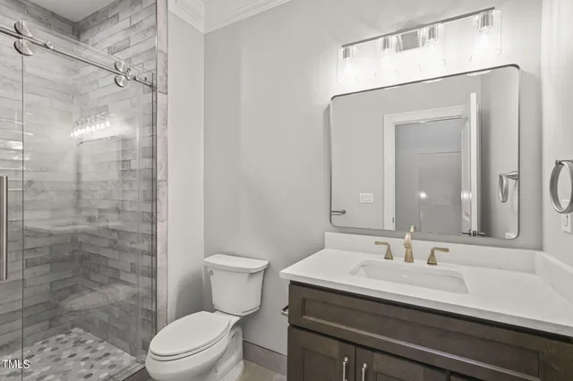 a view of an empty room with glass door