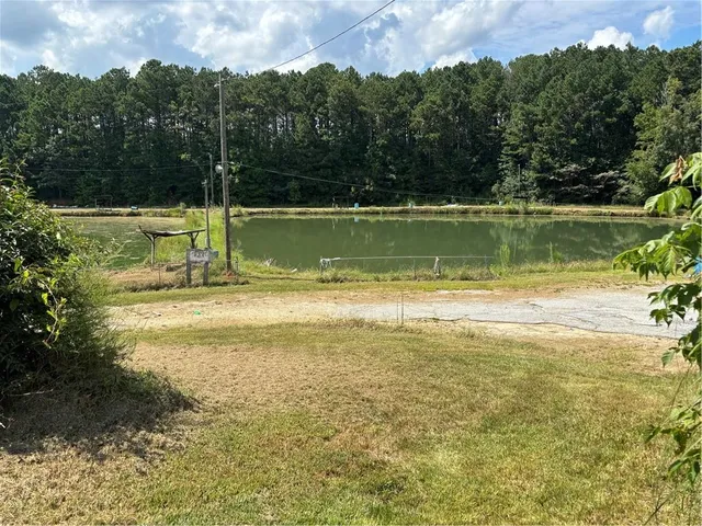 a view of a lake from a yard