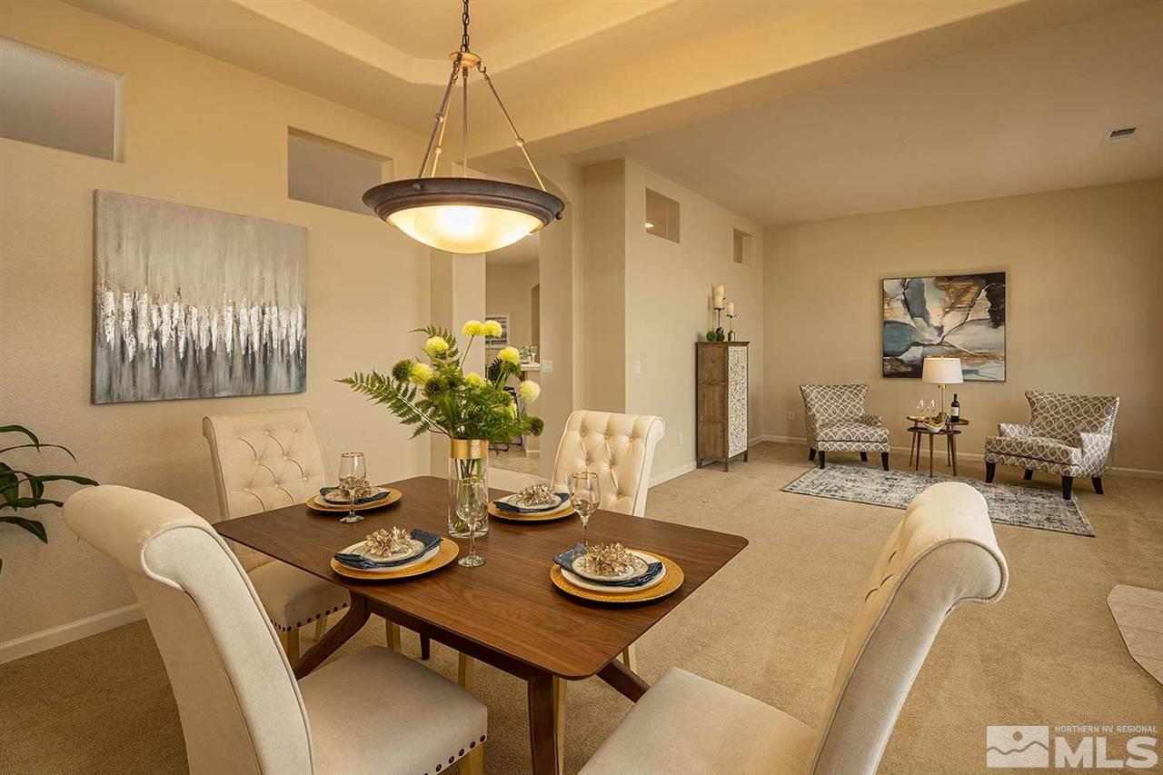 2201 South Tesuque Road Reno, NV 89511 - Photo 18 of 40 a view of a dining room with furniture and chandelier
