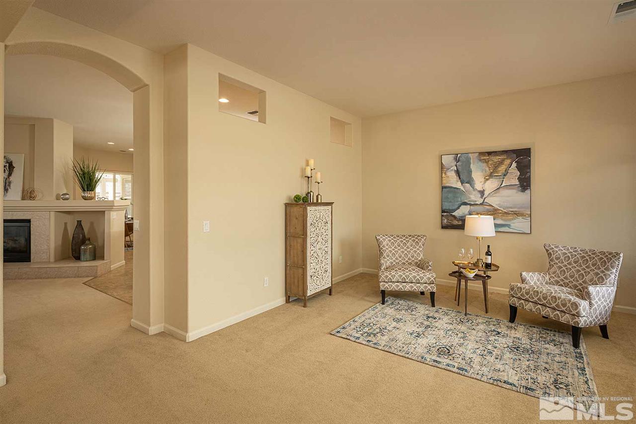 2201 South Tesuque Road Reno, NV 89511 - Photo 20 of 40 a living room with furniture and a table