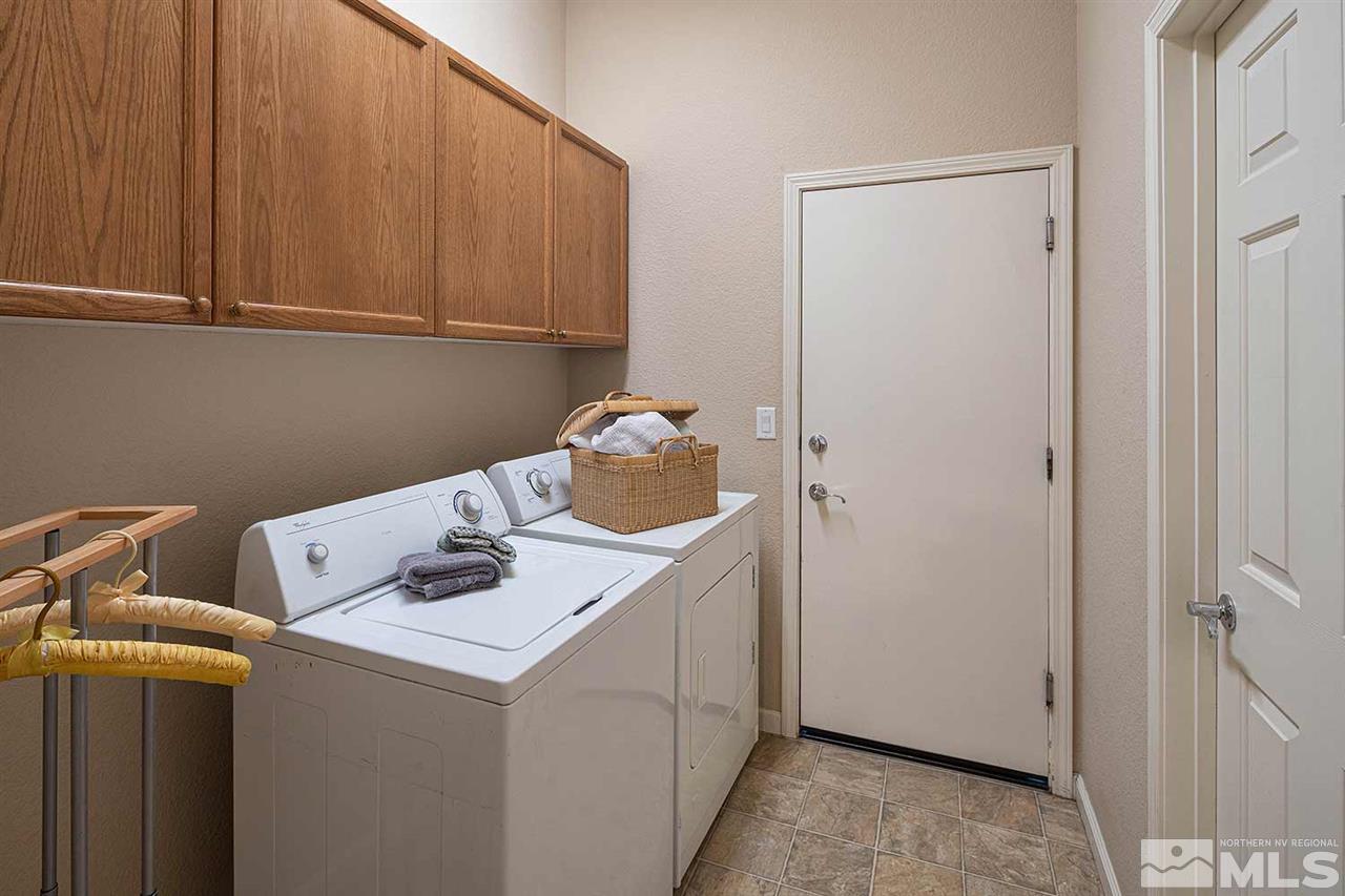 2201 South Tesuque Road Reno, NV 89511 - Photo 31 of 40 a utility room with dryer and washer