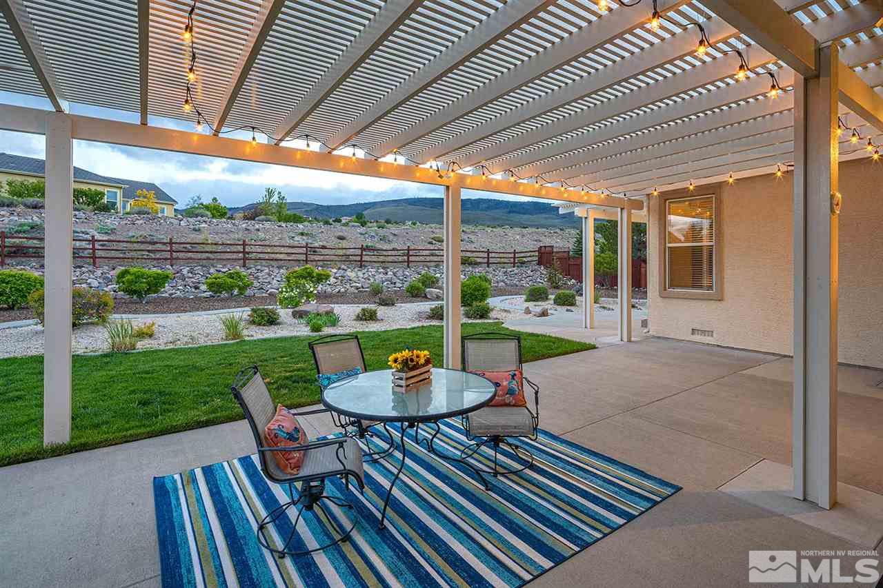 2201 South Tesuque Road Reno, NV 89511 - Photo 33 of 40 a view of a swimming pool with a patio