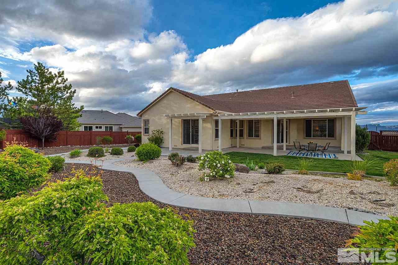 2201 South Tesuque Road Reno, NV 89511 - Photo 35 of 40 front view of a house with a yard