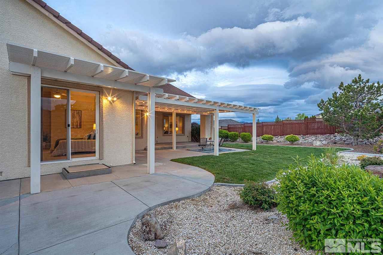 2201 South Tesuque Road Reno, NV 89511 - Photo 37 of 40 a view of a house with backyard and porch
