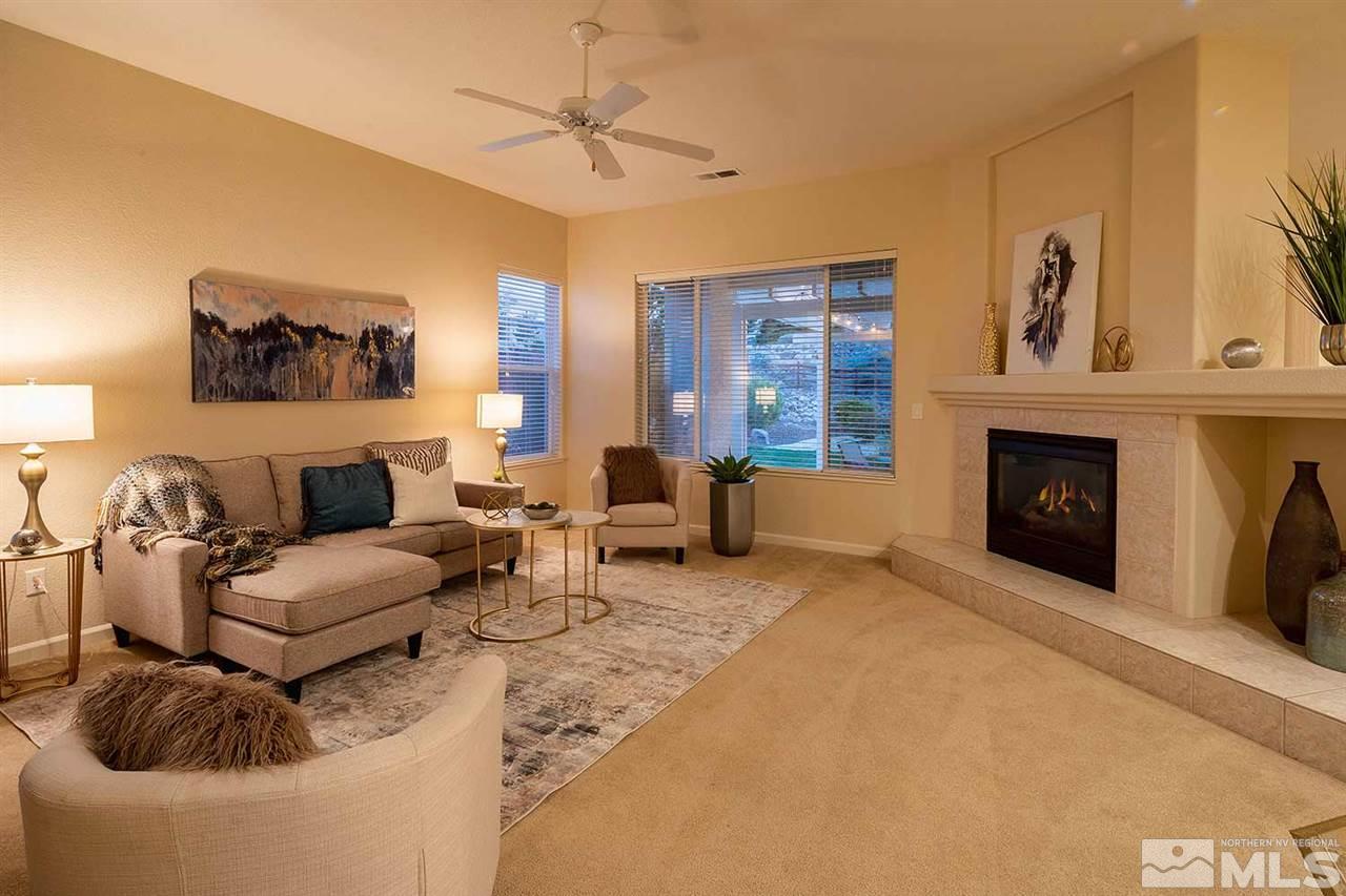 2201 South Tesuque Road Reno, NV 89511 - Photo 4 of 40 a living room with furniture and a fireplace