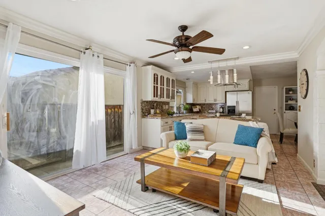 a kitchen with a counter space a sink appliances and cabinets