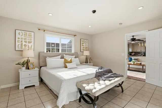 a bedroom with a bed and a cabinets