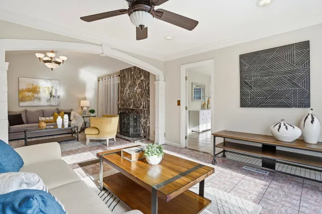 a living room with furniture and a window