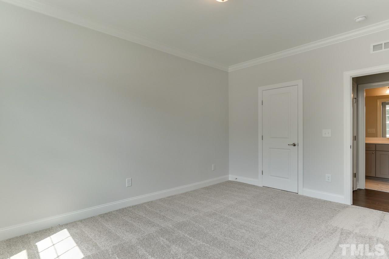 244 Ivory Lane, Unit 72 Raleigh, NC 27610 - Photo 20 of 30 a view of an empty room