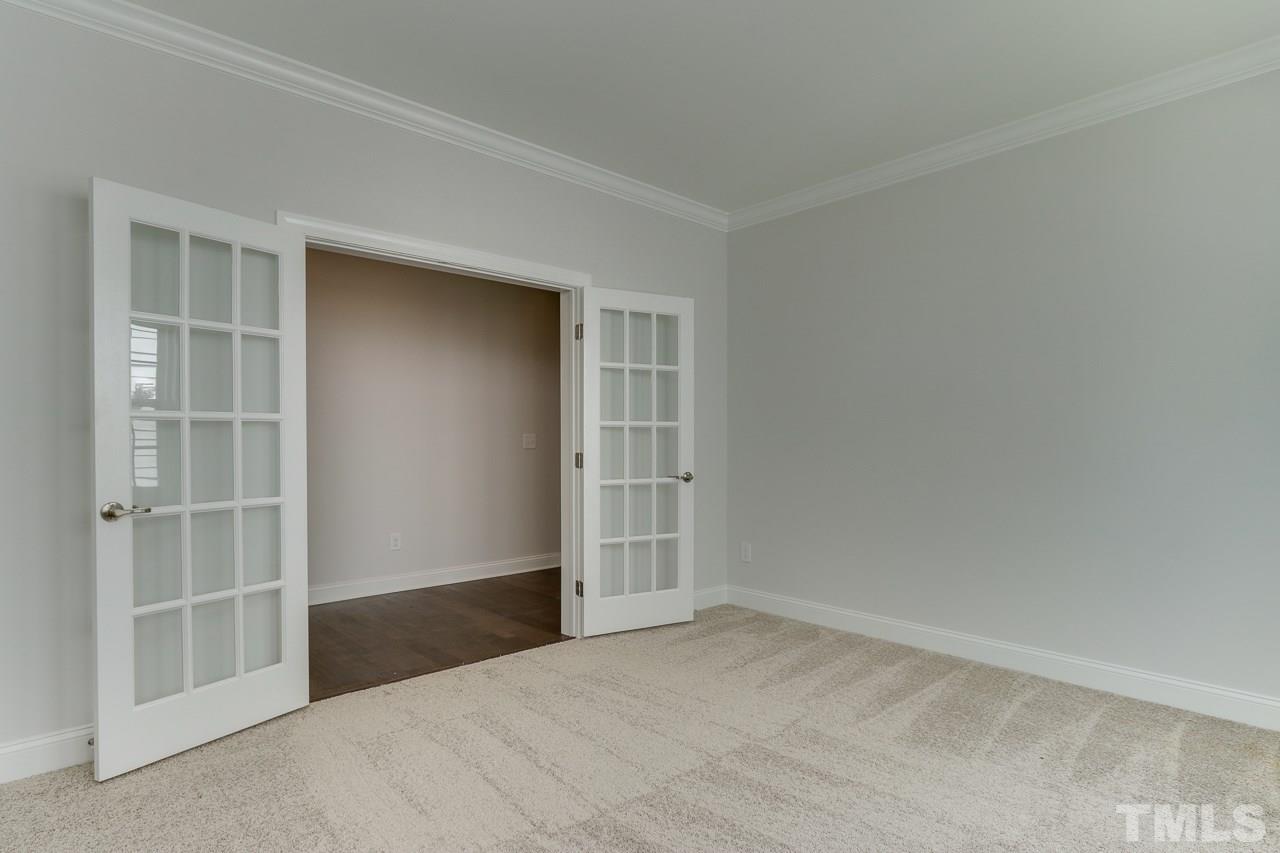 244 Ivory Lane, Unit 72 Raleigh, NC 27610 - Photo 3 of 30 an empty room with closet