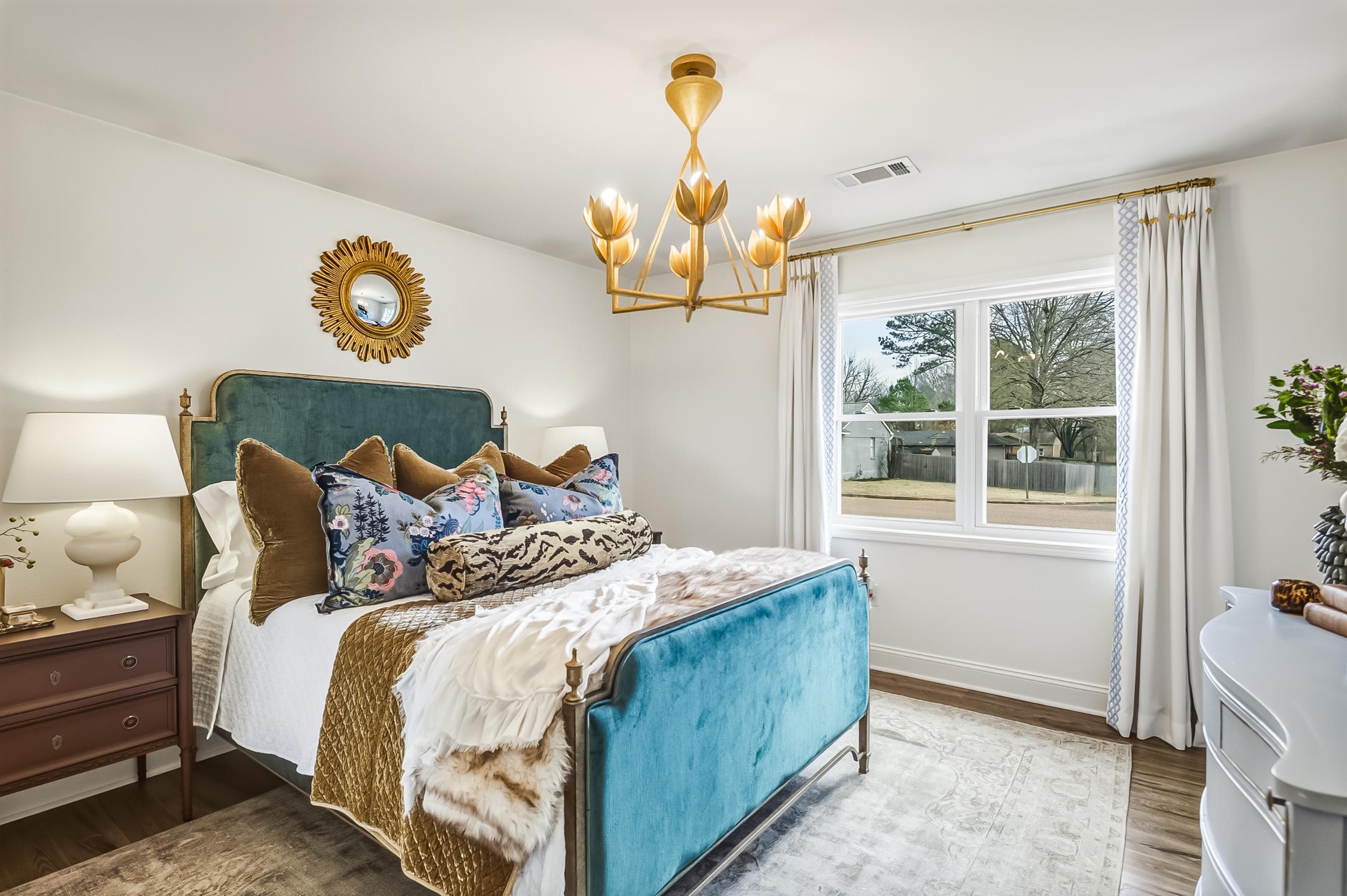 915 Greencliff Road Collierville, TN 38017 - Photo 17 of 32 a bedroom with a bed and a window