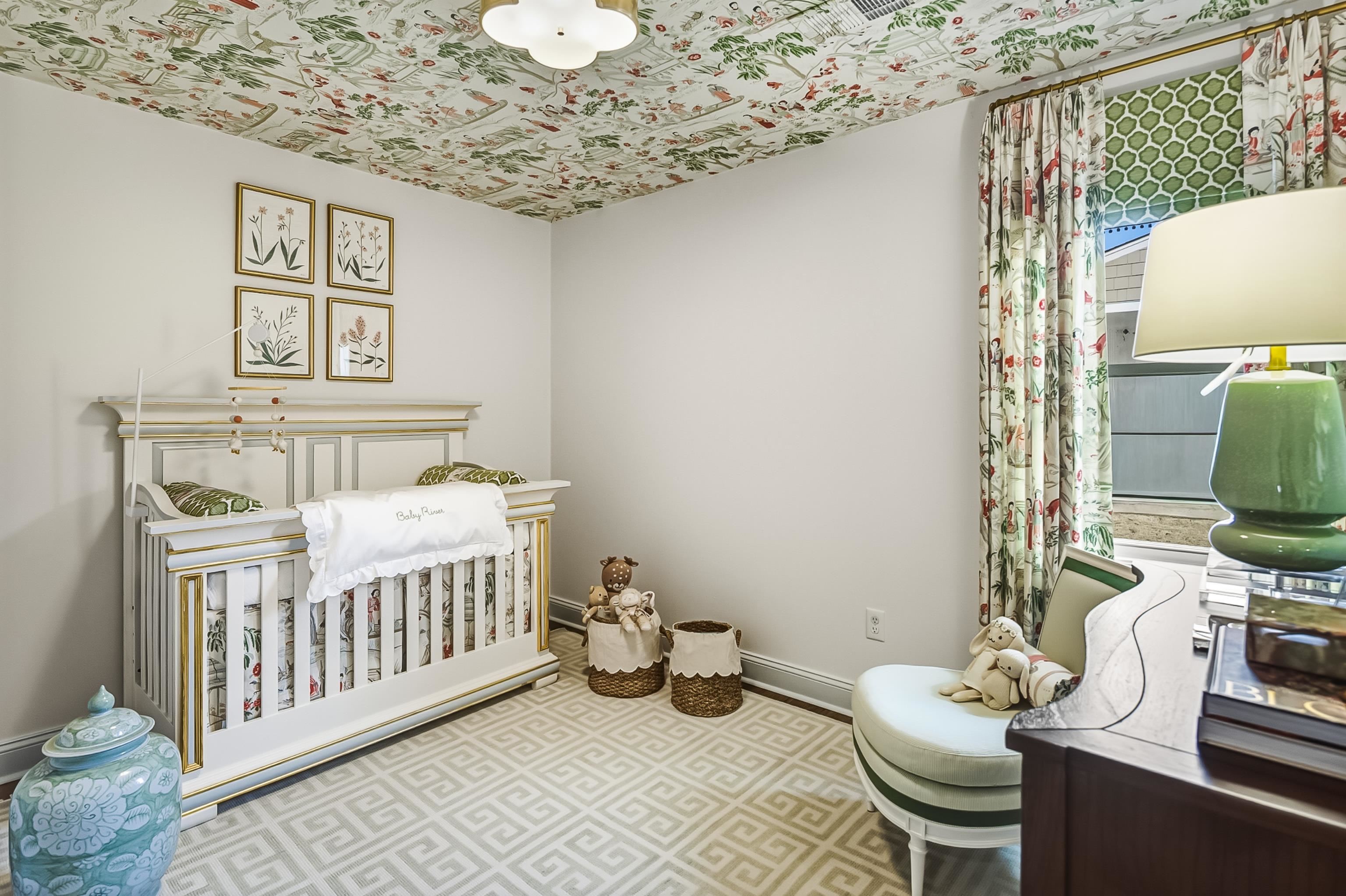 915 Greencliff Road Collierville, TN 38017 - Photo 20 of 32 a bedroom with a bed and wooden floor