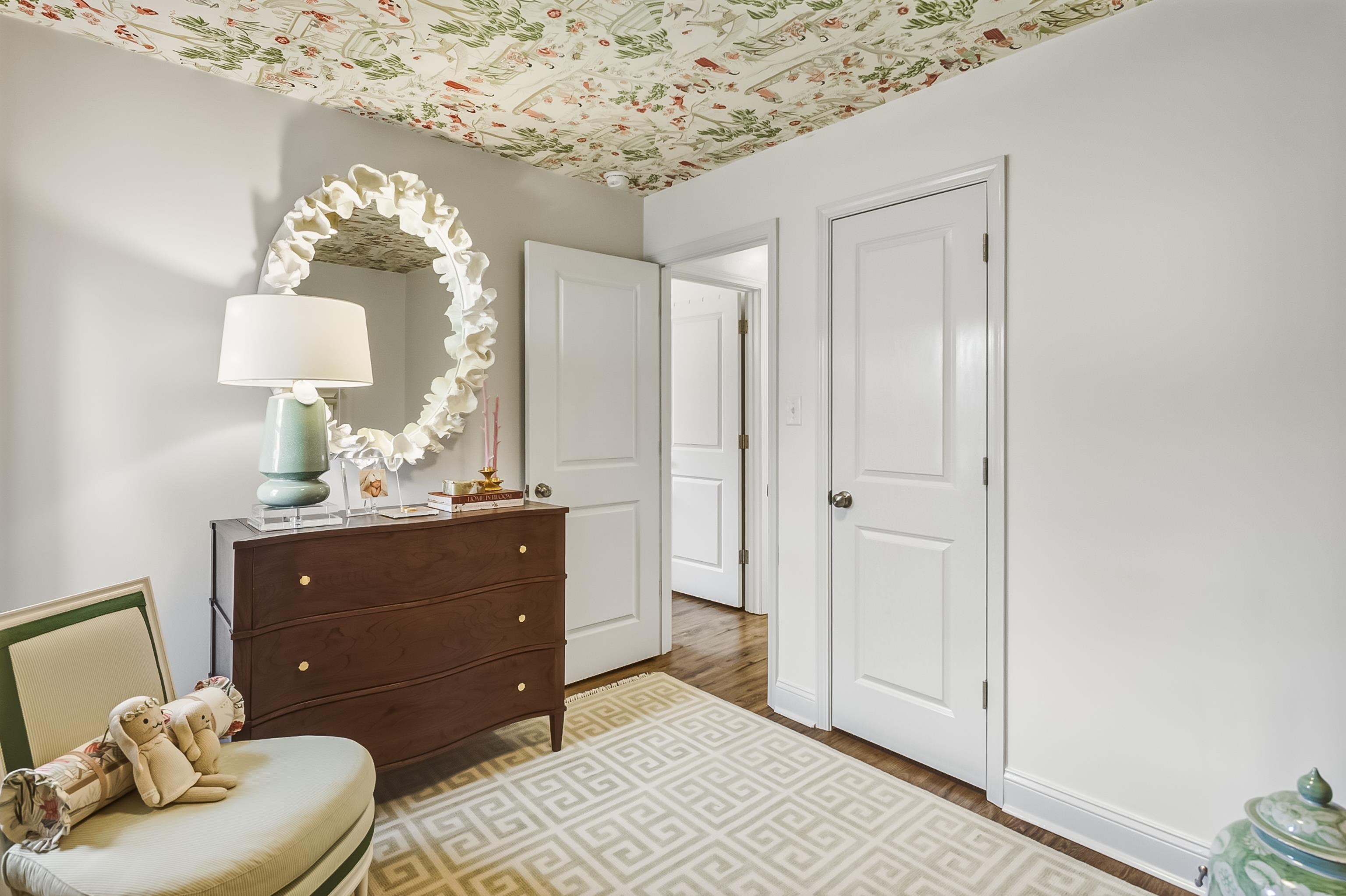 915 Greencliff Road Collierville, TN 38017 - Photo 21 of 32 a room with a mirror and a dresser