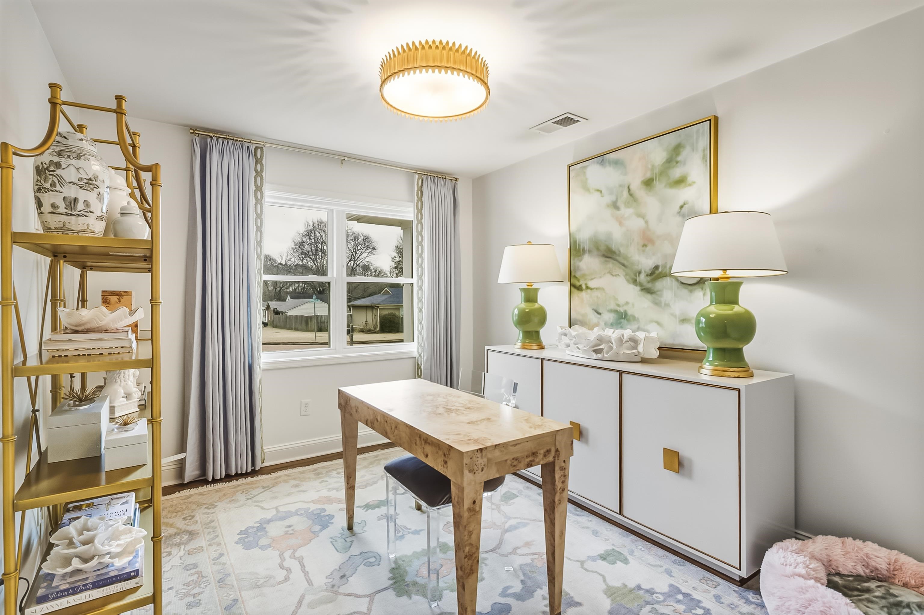 915 Greencliff Road Collierville, TN 38017 - Photo 22 of 32 a kitchen with stainless steel appliances granite countertop a stove a sink and a refrigerator