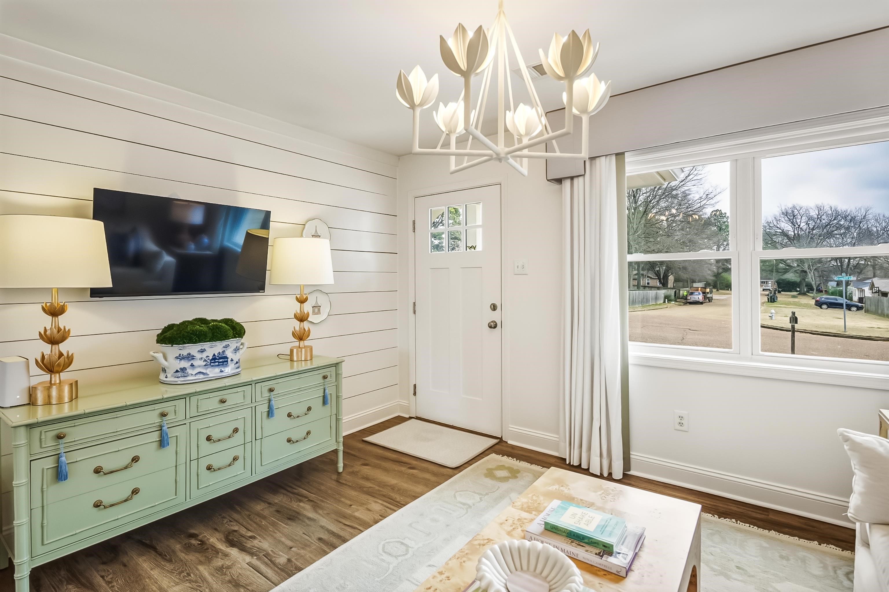 915 Greencliff Road Collierville, TN 38017 - Photo 7 of 32 a bedroom with a bed and a flat screen tv