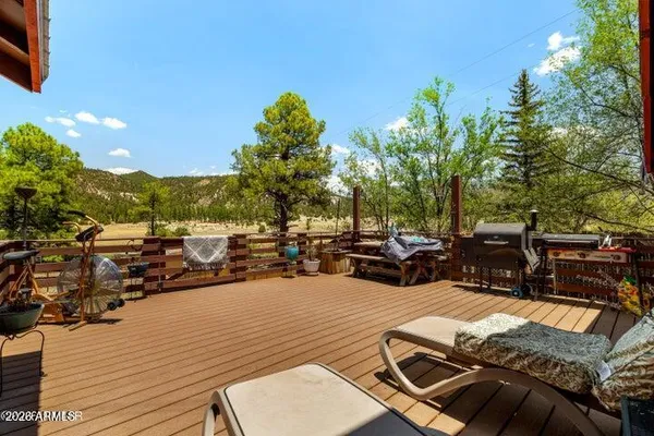 a view of a terrace with sitting area
