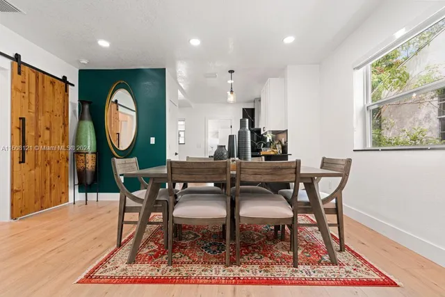 a view of a dining room with furniture