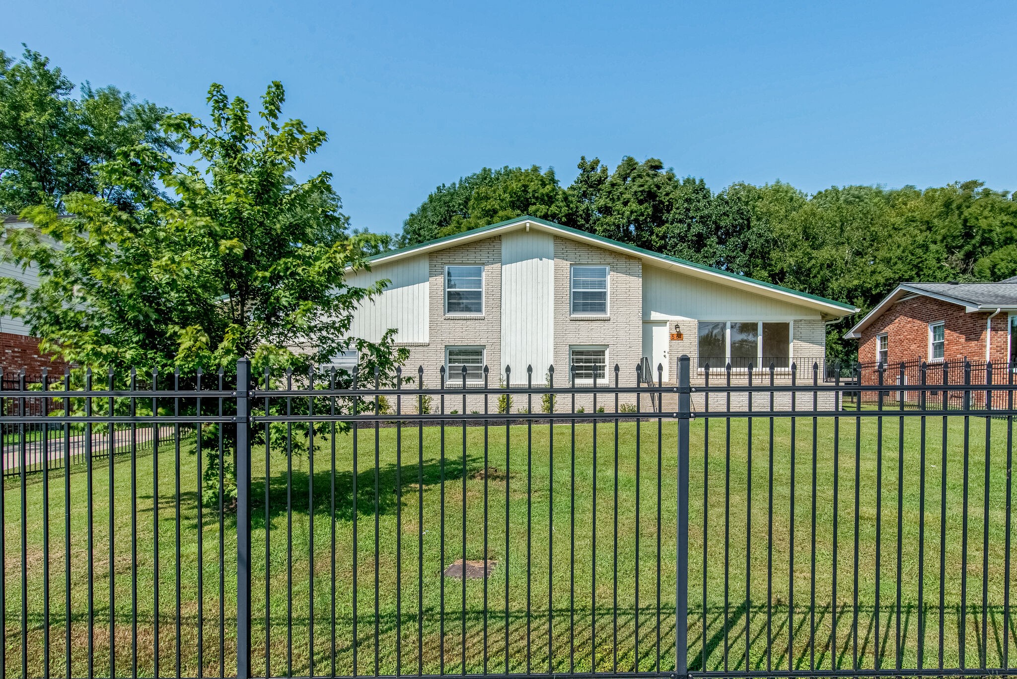 561 Rural Hill Road Nashville, TN 37217 - Photo 2 of 32 a view of a house with a yard and plants