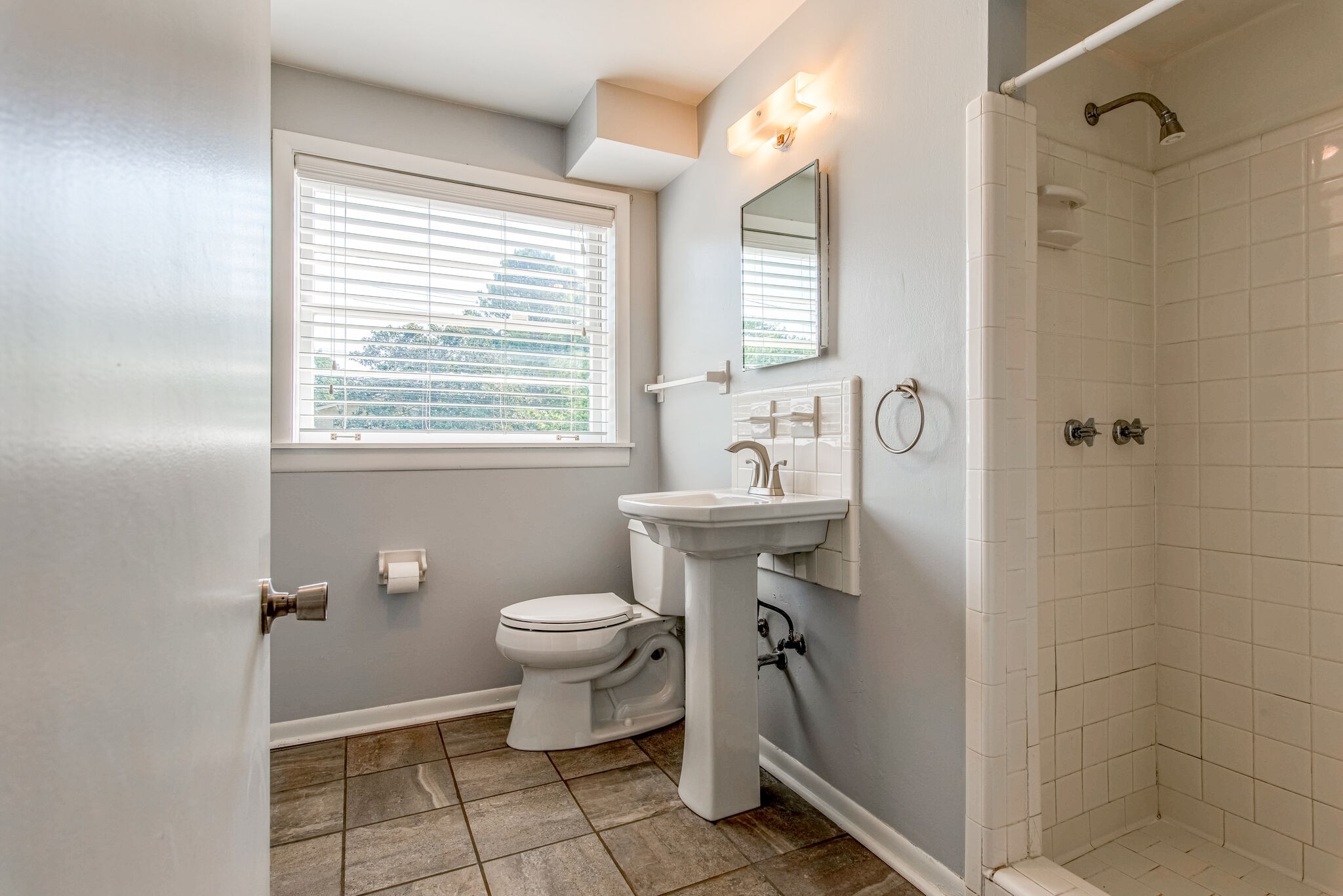 561 Rural Hill Road Nashville, TN 37217 - Photo 17 of 32 a bathroom with a sink toilet and shower