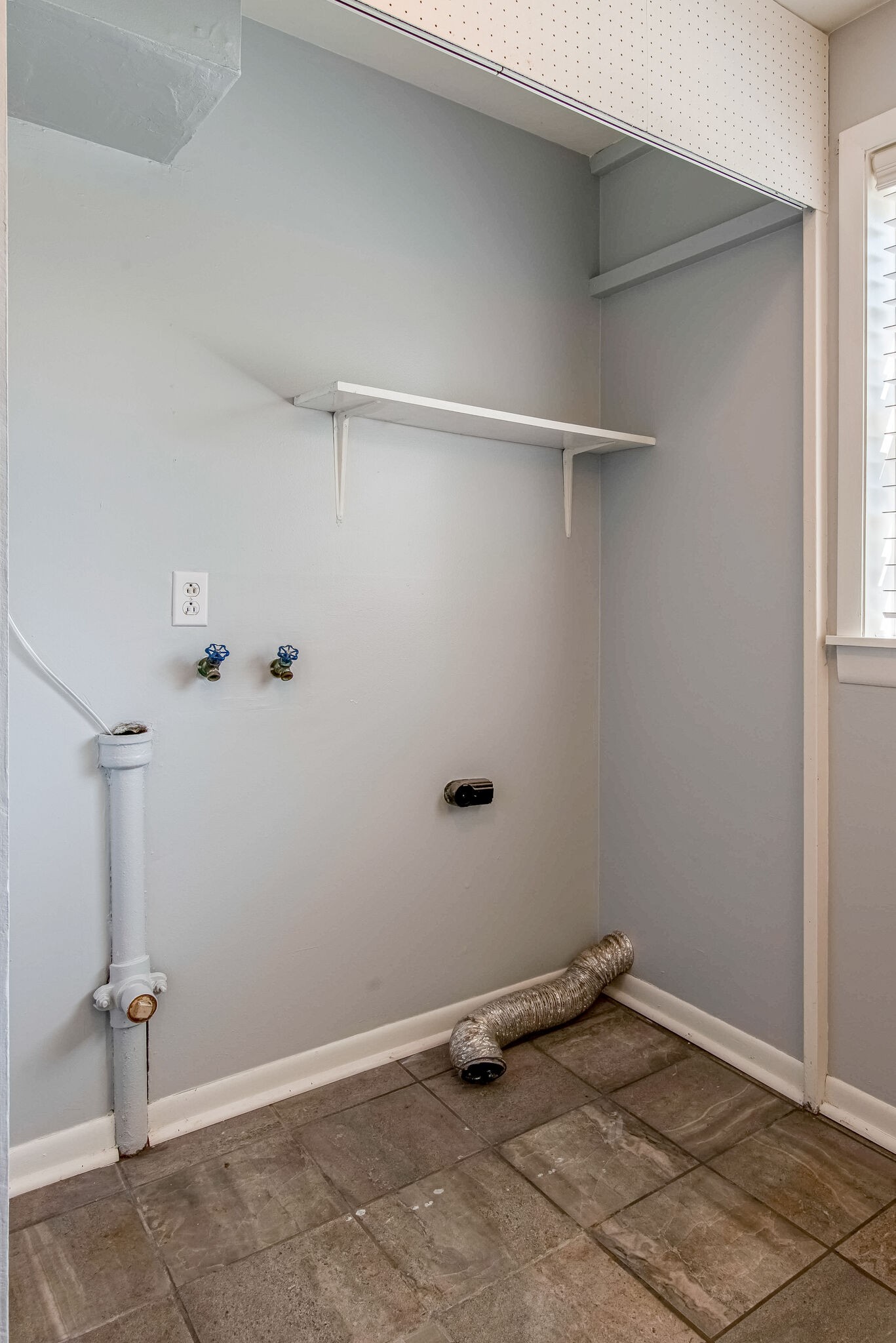 561 Rural Hill Road Nashville, TN 37217 - Photo 18 of 32 a view of a room with racks on the wall