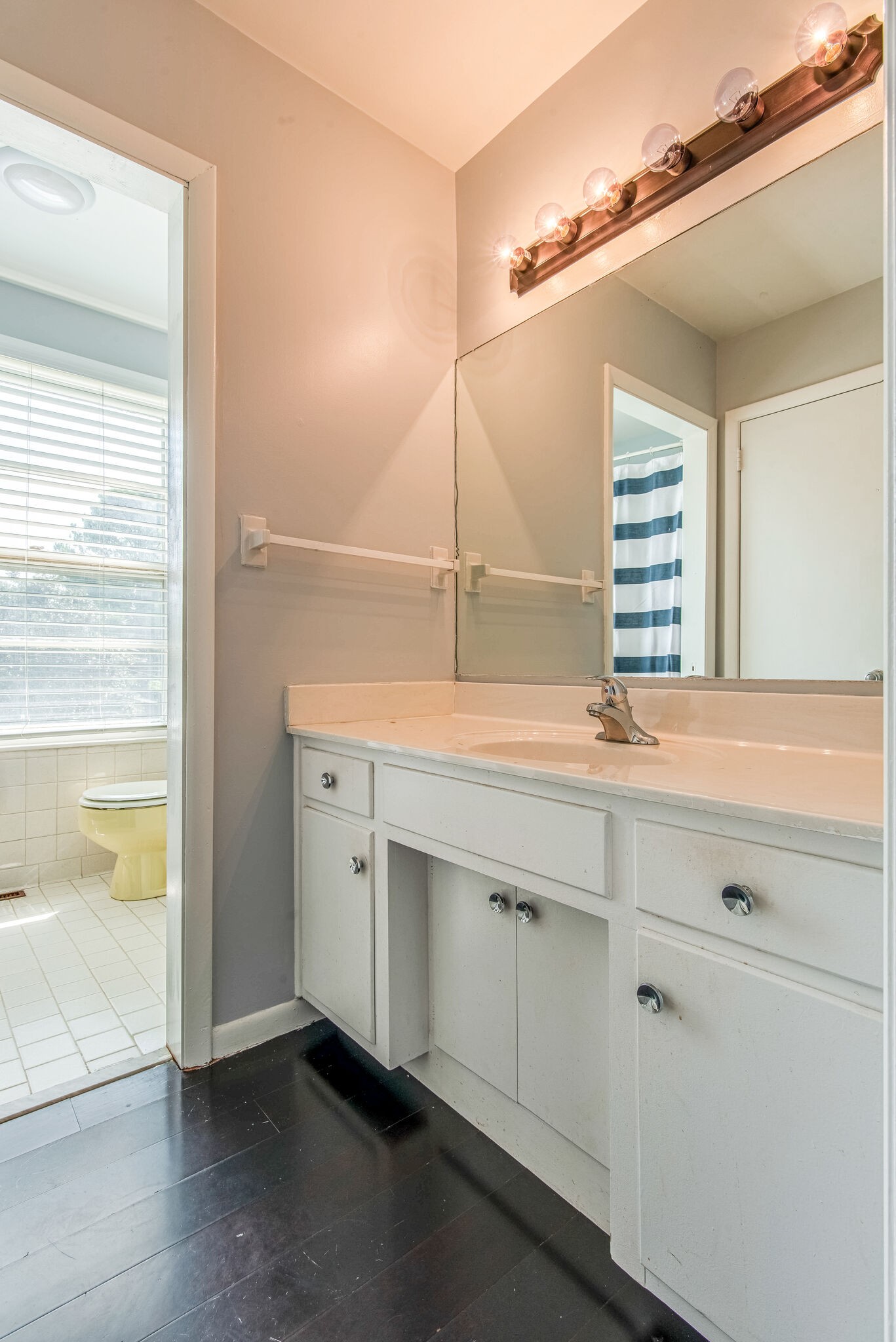 561 Rural Hill Road Nashville, TN 37217 - Photo 23 of 32 a bathroom with a sink and a mirror