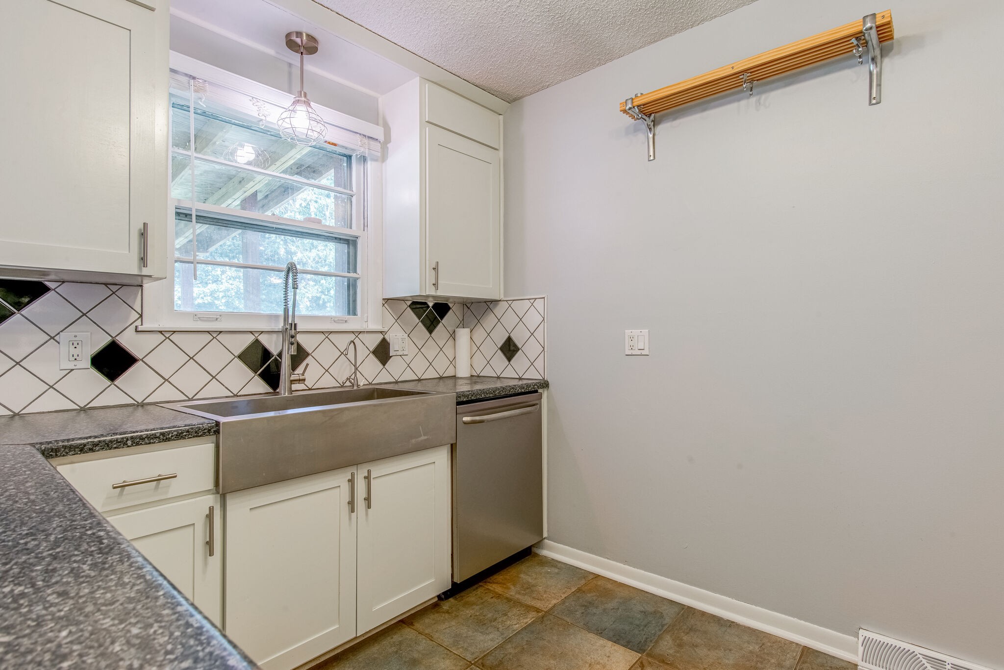 561 Rural Hill Road Nashville, TN 37217 - Photo 10 of 32 a kitchen with a sink cabinets and window